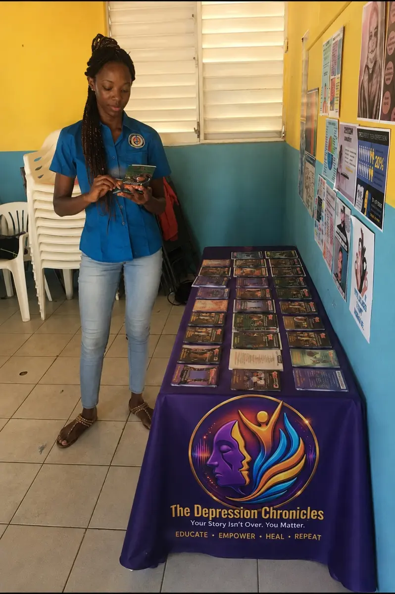 Shelly-Ann Shaw presenting beside a Depression Chronicles resource display
